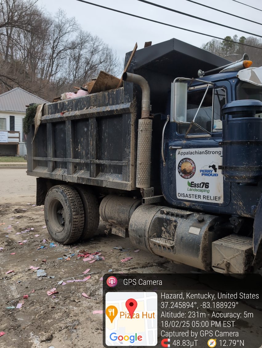 Loading flood debris